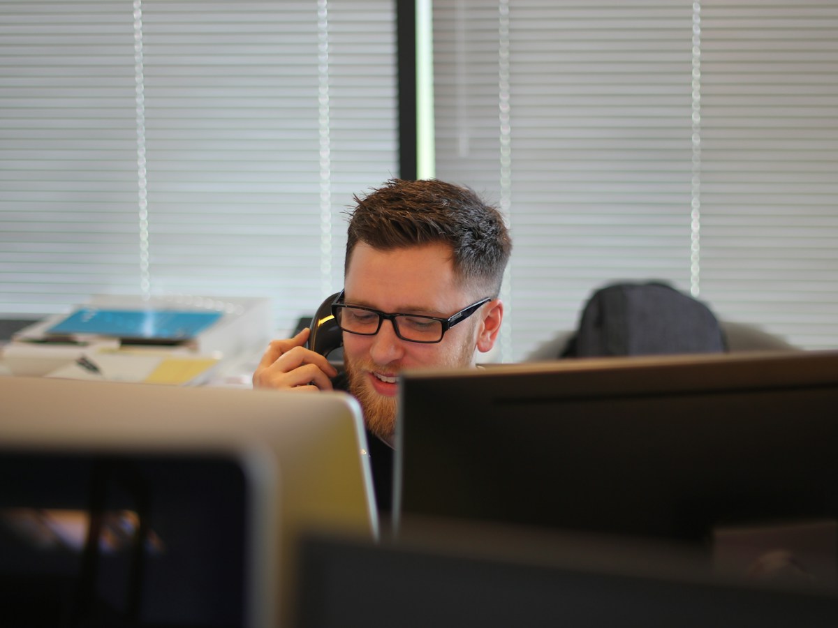 Dedicated case manager speaking with a client